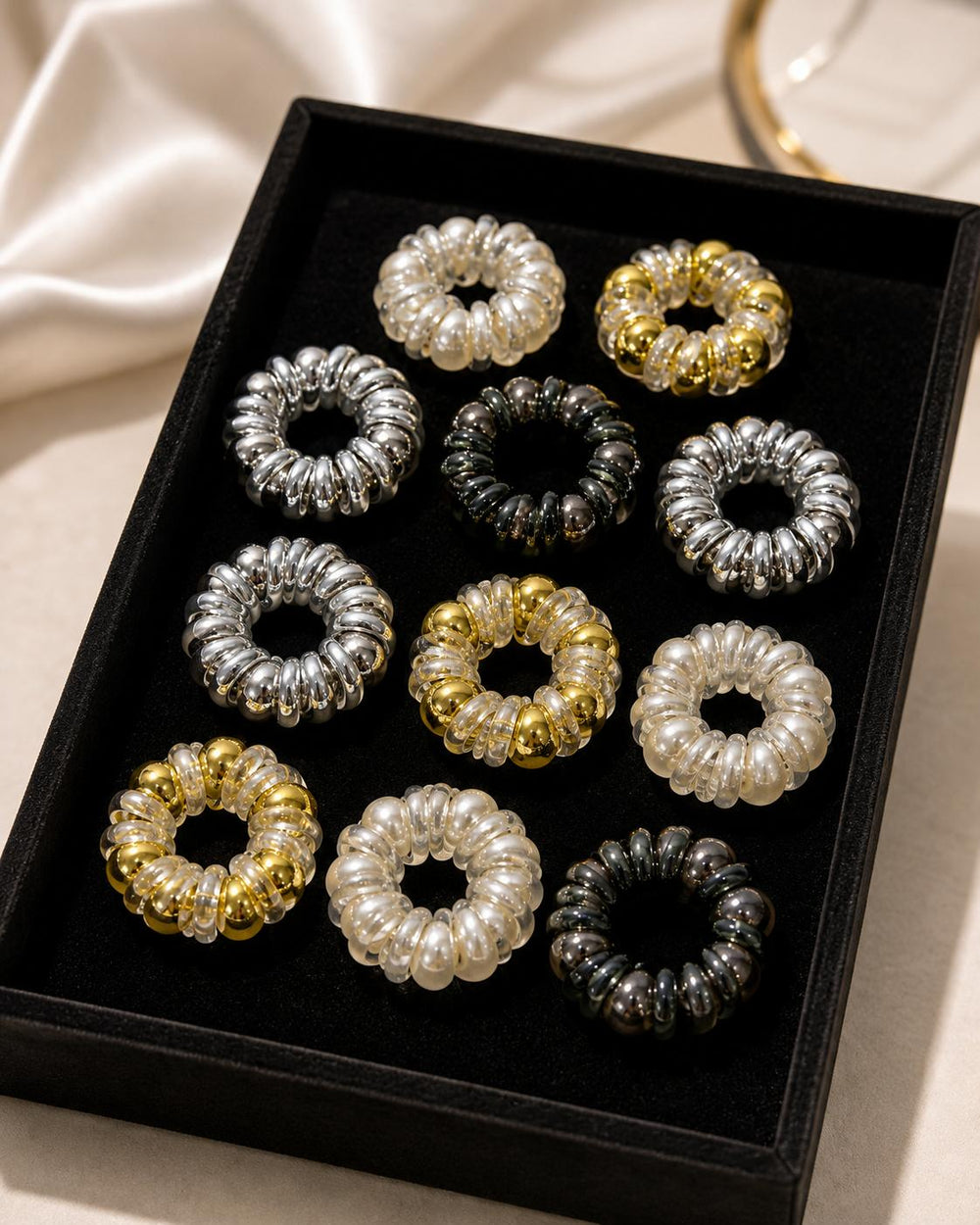Metallic bead spiral hair ties loose