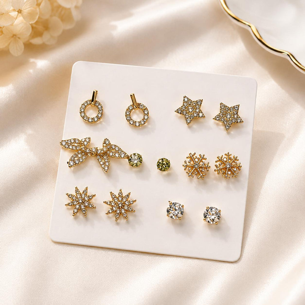 MMJ weekday earrings loose flatlay