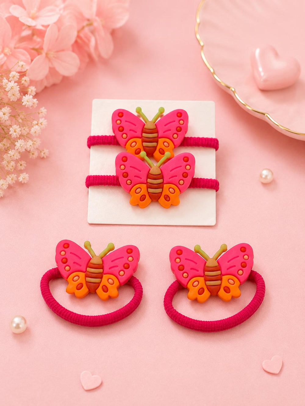 Butterfly hair ties pink and orange loose